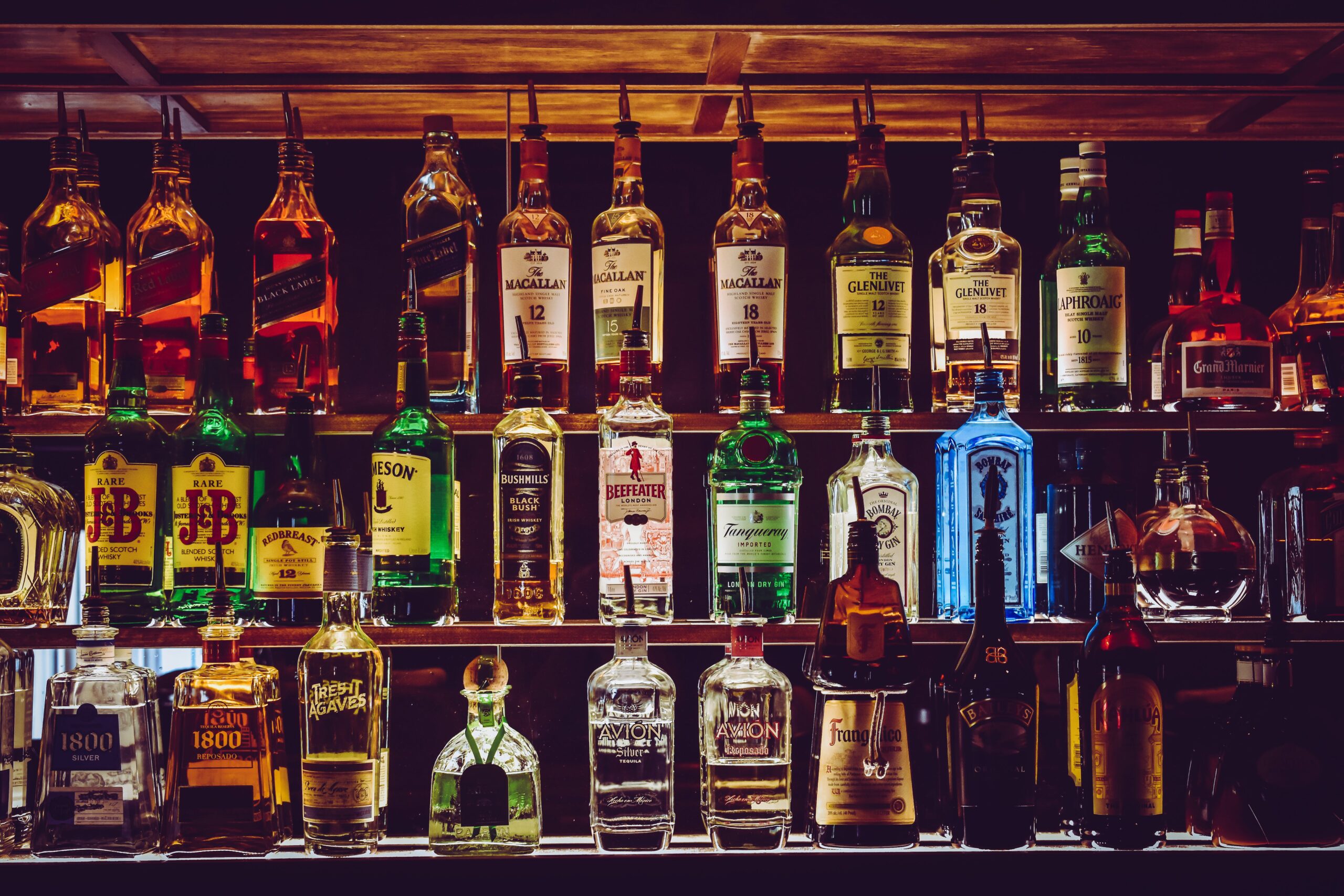 a selection of spirits on a shelf